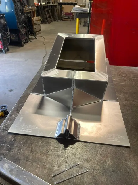 Spring isolation curb fabrication detail