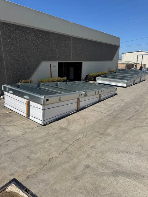Spring isolation curbs staged for delivery