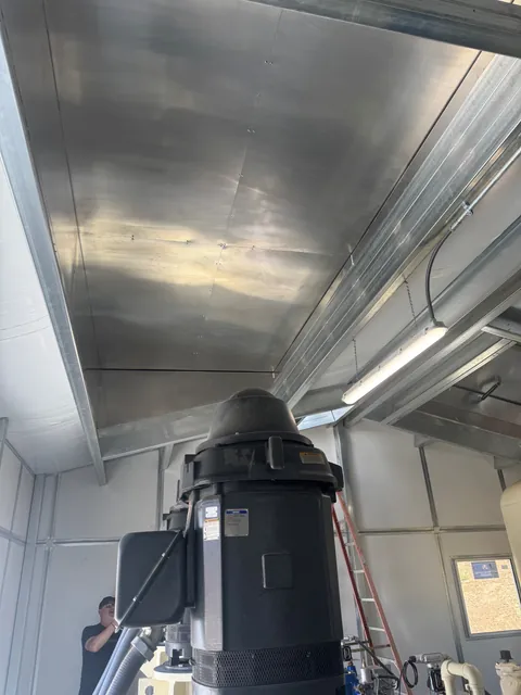 Custom curb and ductwork in a mechanical room