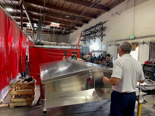 Twin-leaf roof hatch being assembled in the shop