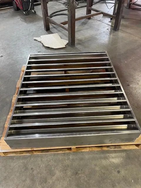 Formed steel wall louver on a pallet in the shop
